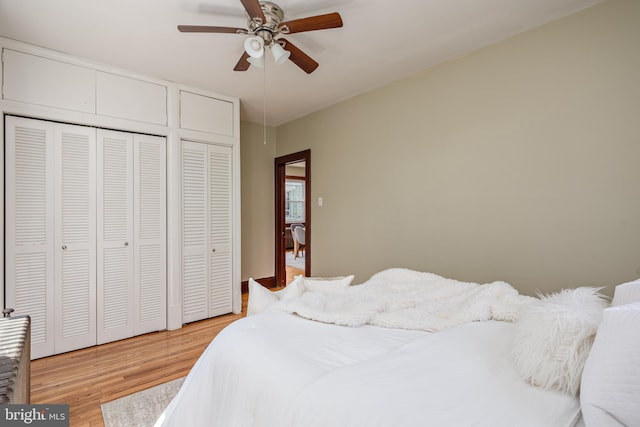 3023 Chesley, Baltimore, MD 21234 - bedroom with multiple closets, light wood-style flooring, and ceiling fan