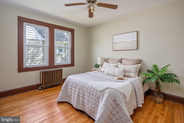 3023 Chesley, Baltimore, MD 21234 - bedroom with radiator heating unit, light wood-style floors, baseboards, and a ceiling fan
