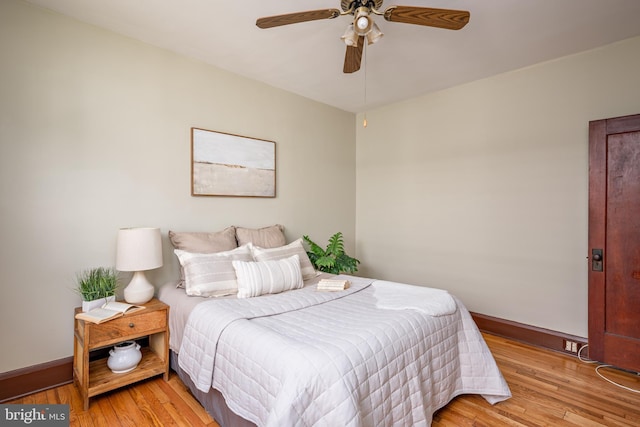 3023 Chesley, Baltimore, MD 21234 - bedroom with light wood-type flooring, baseboards, and a ceiling fan