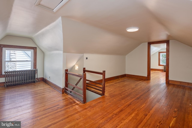 3023 Chesley, Baltimore, MD 21234 - additional living space featuring hardwood / wood-style floors, lofted ceiling, and baseboards