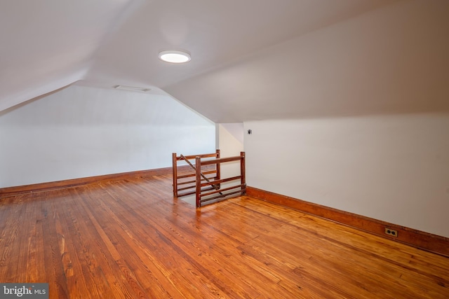 3023 Chesley, Baltimore, MD 21234 - bonus room featuring vaulted ceiling, wood finished floors, and baseboards