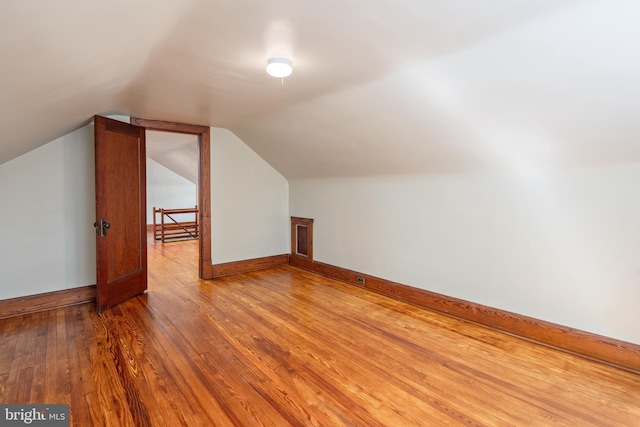 3023 Chesley, Baltimore, MD 21234 - additional living space with wood finished floors, lofted ceiling, and baseboards