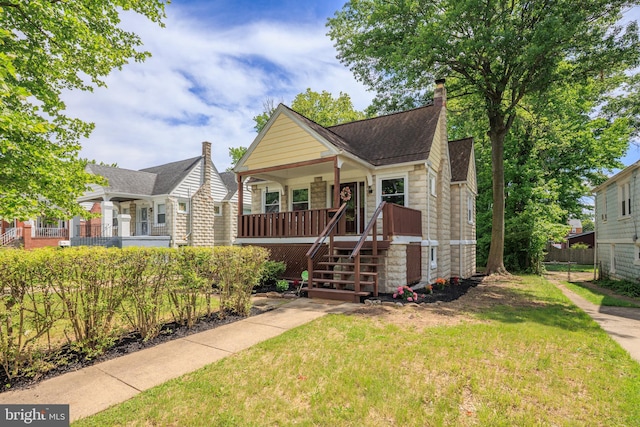 3023 Chesley, Baltimore, MD 21234 - bungalow with a front lawn, a porch, a chimney, a shingled roof, and stairway