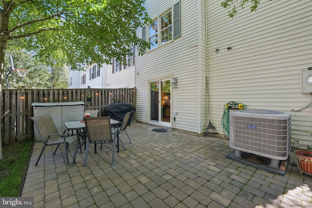 6090 Crown Royal Cir, Alexandria, VA 22310 - fenced backyard with outdoor dining space, a patio, and area for grilling