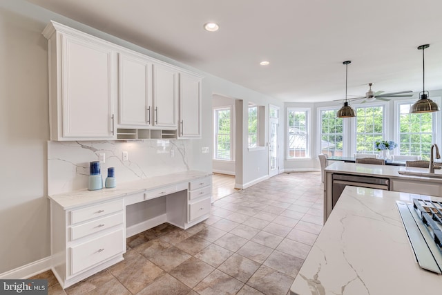 42720 Mount Auburn Pl, Broadlands, VA 20148 - kitchen with baseboards, decorative backsplash, white cabinets, and recessed lighting
