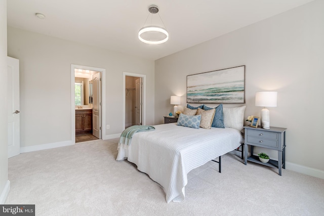 42720 Mount Auburn Pl, Broadlands, VA 20148 - carpeted bedroom featuring baseboards and connected bathroom