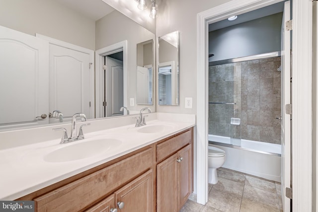 42720 Mount Auburn Pl, Broadlands, VA 20148 - full bathroom with toilet, double vanity, and shower / bath combination with glass door