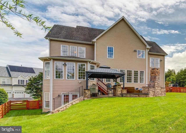 42720 Mount Auburn Pl, Broadlands, VA 20148 - rear view of house with a gazebo and roof with shingles