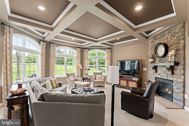 22415 Conservancy Dr, Ashburn, VA 20148 - living room featuring coffered ceiling, ornamental molding, a fireplace, beam ceiling, and light colored carpet