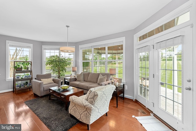 22415 Conservancy Dr, Ashburn, VA 20148 - living area featuring wood finished floors and baseboards