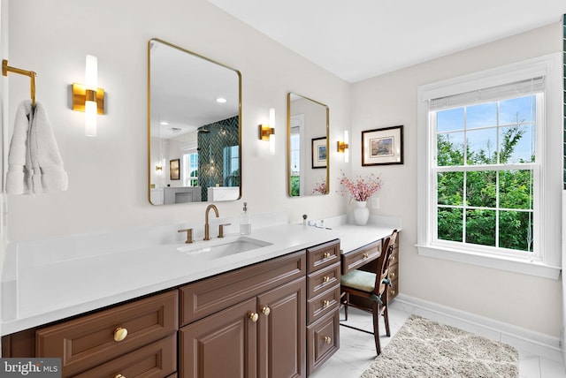 22415 Conservancy Dr, Ashburn, VA 20148 - bathroom featuring vanity, baseboards, and tile patterned flooring