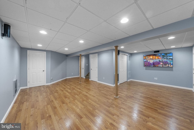 3 River Birch Cir, Princeton, NJ 08540 - finished basement with light wood-style floors, baseboards, a paneled ceiling, and recessed lighting