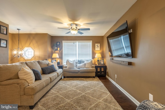 15245 Wedgewood Dr, Greencastle, PA 17225 - living room with baseboards, a chandelier, wood finished floors, and ceiling fan