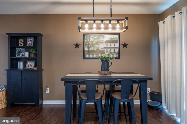 15245 Wedgewood Dr, Greencastle, PA 17225 - dining area with dark wood-style floors, baseboards, and a chandelier
