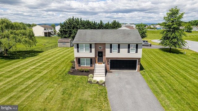 15245 Wedgewood Dr, Greencastle, PA 17225 - raised ranch featuring brick siding, driveway, and an attached garage