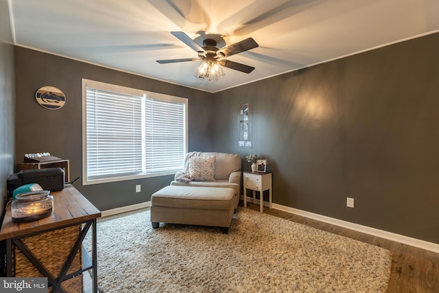 15245 Wedgewood Dr, Greencastle, PA 17225 - living area with ceiling fan, wood finished floors, baseboards, and ornamental molding