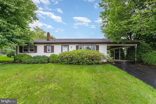 335 Bolton Ave, Carlisle, PA 17013 - single story home with driveway, an attached carport, a chimney, and a front lawn