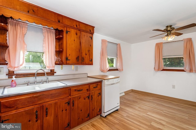 335 Bolton Ave, Carlisle, PA 17013 - kitchen with dishwasher, a sink, plenty of natural light, and light wood-style floors