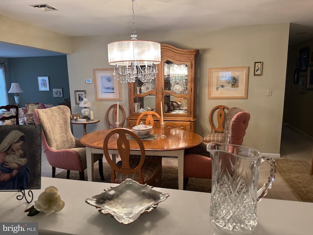 3001 E Chestnut Ave Unit G62, Vineland, NJ 08361 - dining area with a chandelier