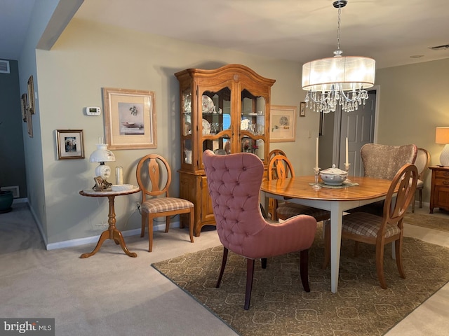 3001 E Chestnut Ave Unit G62, Vineland, NJ 08361 - dining space with a chandelier, carpet floors, and baseboards