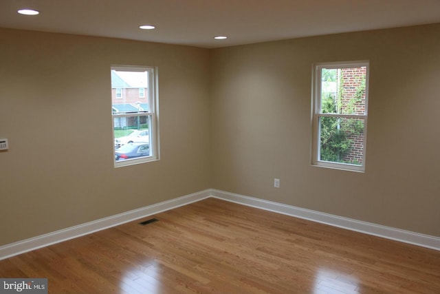 1317 Winston Ave, Baltimore, MD 21239 - unfurnished room featuring wood finished floors and recessed lighting