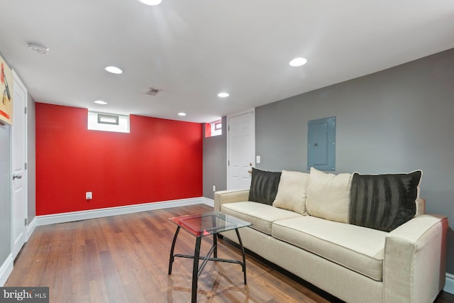 1317 Winston Ave, Baltimore, MD 21239 - living area with electric panel, recessed lighting, and wood finished floors