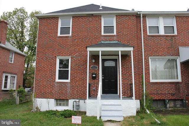 1317 Winston Ave, Baltimore, MD 21239 - townhome / multi-family property with brick siding