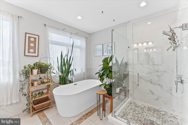 721 Daly St, Philadelphia, PA 19148 - full bath featuring a marble finish shower, a freestanding tub, and recessed lighting