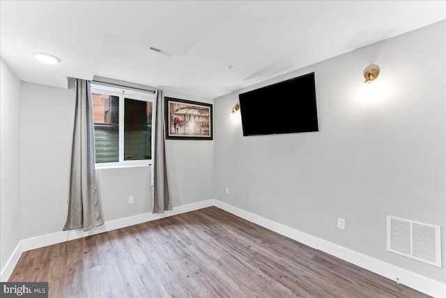 721 Daly St, Philadelphia, PA 19148 - spare room featuring wood finished floors and baseboards