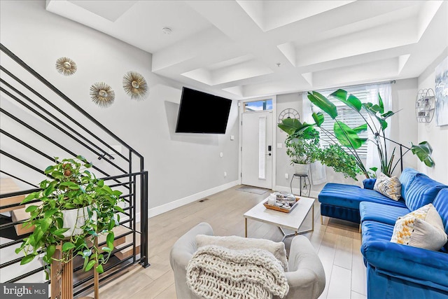 721 Daly St, Philadelphia, PA 19148 - living room featuring coffered ceiling, baseboards, light wood-type flooring, and beamed ceiling