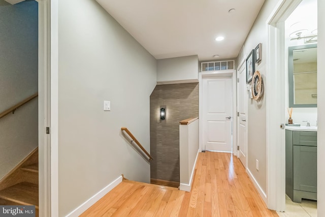 211 Brown St Unit 15, Philadelphia, PA 19123 - hallway with an upstairs landing, light wood finished floors, baseboards, and recessed lighting