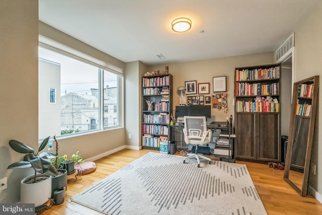 211 Brown St Unit 15, Philadelphia, PA 19123 - home office with wood finished floors and baseboards