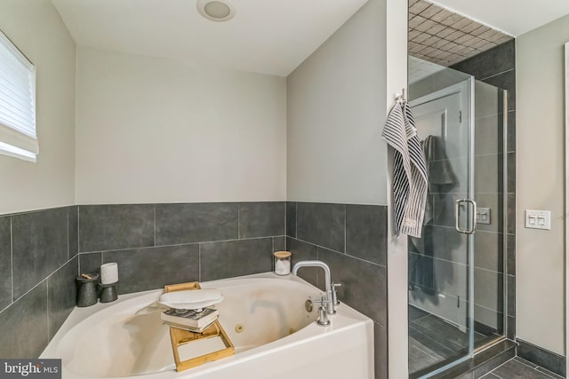 211 Brown St Unit 15, Philadelphia, PA 19123 - bathroom featuring a whirlpool tub and a shower stall