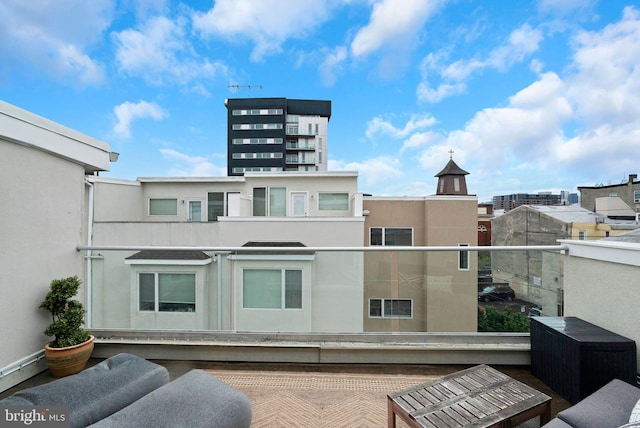 211 Brown St Unit 15, Philadelphia, PA 19123 - rear view of property featuring stucco siding and a balcony