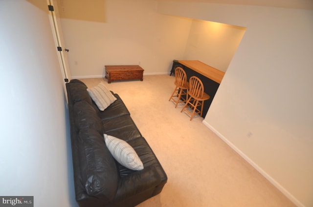 6385 Hunters Crossing Ct, Eldersburg, MD 21784 - carpeted living room with baseboards and a bar