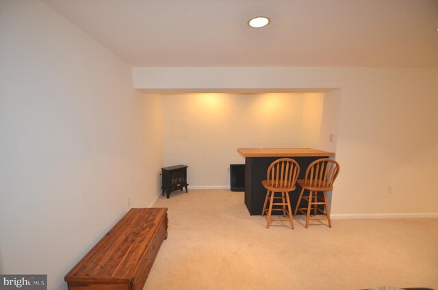 6385 Hunters Crossing Ct, Eldersburg, MD 21784 - carpeted dining room with a bar, baseboards, and recessed lighting