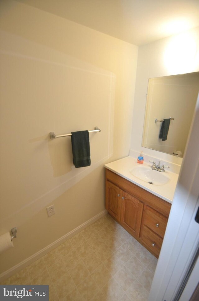 6385 Hunters Crossing Ct, Eldersburg, MD 21784 - bathroom featuring vanity, baseboards, and tile patterned floors