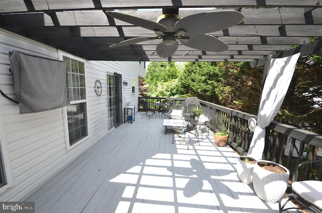 6385 Hunters Crossing Ct, Eldersburg, MD 21784 - wooden deck featuring outdoor dining space, a pergola, and ceiling fan