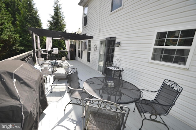 6385 Hunters Crossing Ct, Eldersburg, MD 21784 - wooden deck with outdoor dining area and a pergola