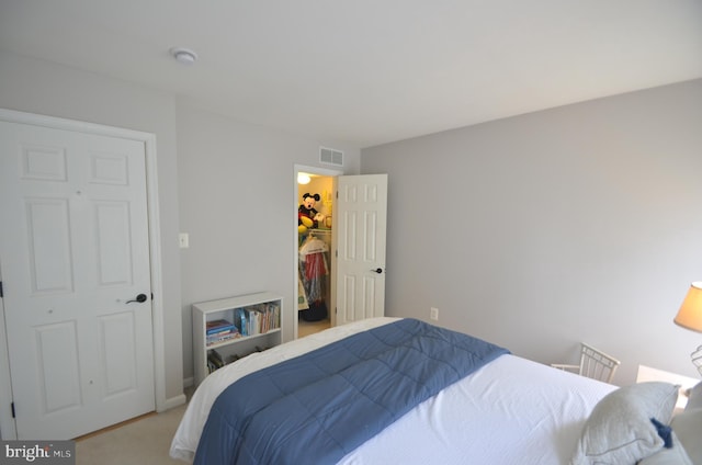 6385 Hunters Crossing Ct, Eldersburg, MD 21784 - bedroom featuring light colored carpet, a walk in closet, and a closet