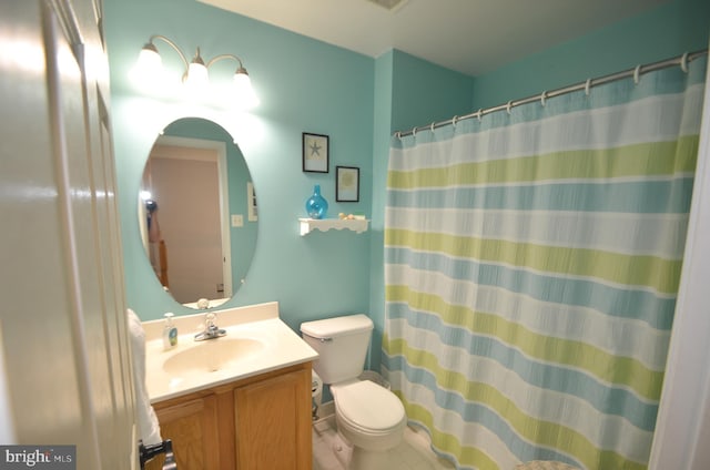 6385 Hunters Crossing Ct, Eldersburg, MD 21784 - bathroom featuring toilet, vanity, a shower with curtain, and tile patterned floors