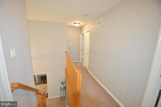 6385 Hunters Crossing Ct, Eldersburg, MD 21784 - corridor with an upstairs landing, light carpet, and baseboards