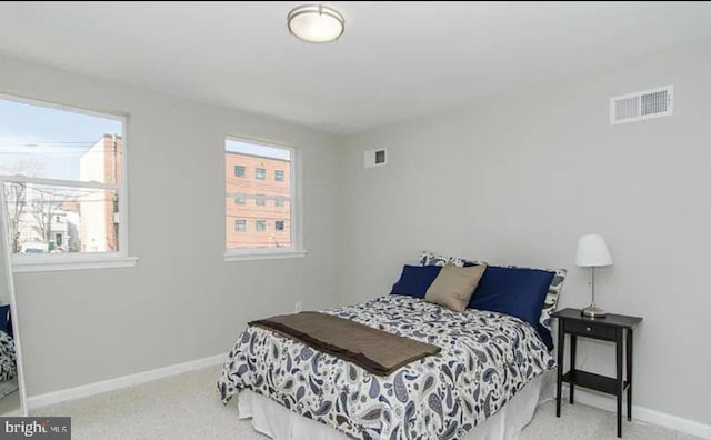 524 N Patterson Park Ave N, Baltimore, MD 21205 - carpeted bedroom with baseboards
