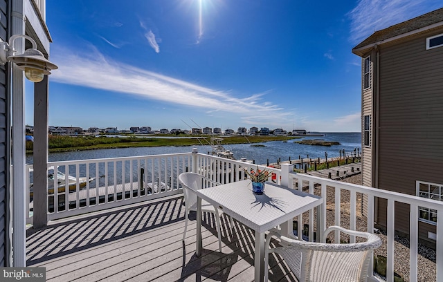 39 Kentucky Dr, Little Egg Harbor Twp, NJ 08087 - balcony featuring a water view and outdoor dining space