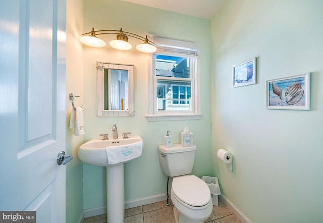 39 Kentucky Dr, Little Egg Harbor Twp, NJ 08087 - bathroom featuring toilet, baseboards, tile patterned floors, and a sink