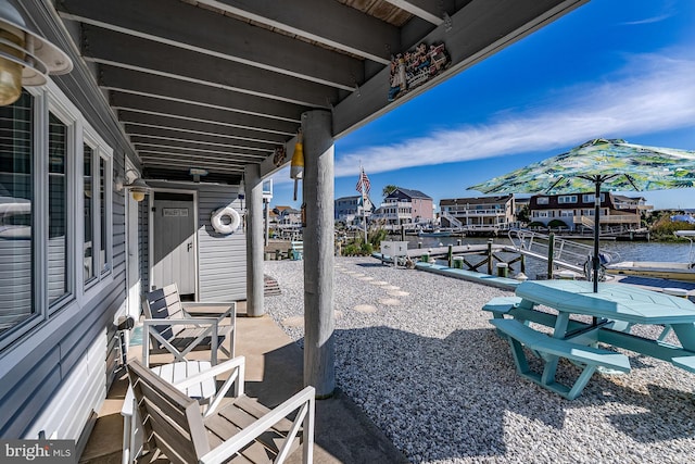 39 Kentucky Dr, Little Egg Harbor Twp, NJ 08087 - view of patio / terrace with a boat dock and a water view