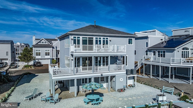 39 Kentucky Dr, Little Egg Harbor Twp, NJ 08087 - rear view of house featuring a patio and a wooden deck