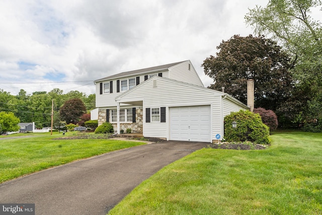 1070 Decker Ln, Warminster, PA 18974 - traditional-style home featuring an attached garage, a front yard, asphalt driveway, and stone siding