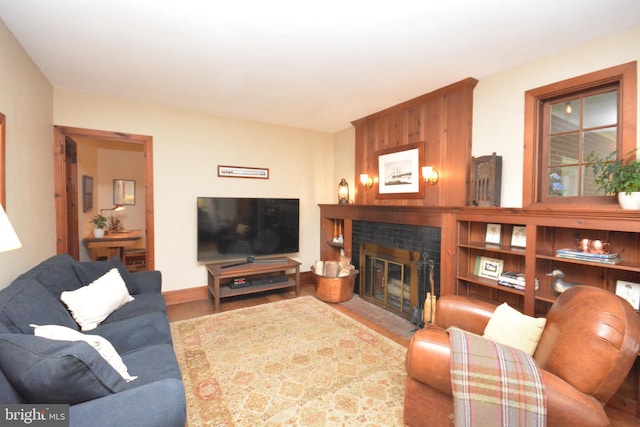 1598 Hollywood Dr, Lancaster, PA 17601 - living area featuring wood finished floors and a fireplace with flush hearth