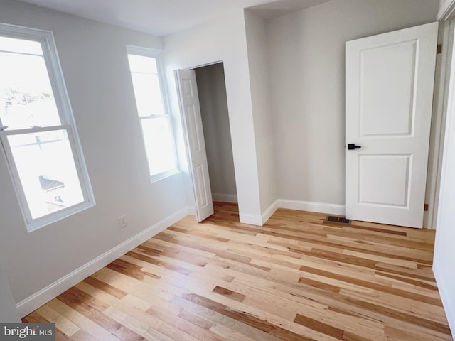 2015 S 23rd St, Philadelphia, PA 19145 - unfurnished bedroom with light wood finished floors and baseboards